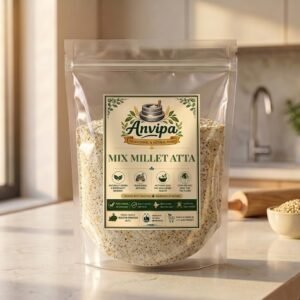 A premium pouch of Anvipa chemical-free Mix Millet Atta displayed alongside diverse raw millets, representing stone milled multi millet flour.