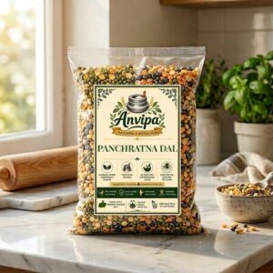 A premium pouch of Anvipa chemical-free Pure Panchratna Dal beside a small bowl showing clean, raw, unpolished 5-grain split pulse mix.
