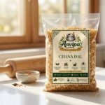 A premium pouch of Anvipa chemical-free Pure Desi Chana Dal beside a small bowl showing clean, raw, and unpolished yellow split Bengal gram.